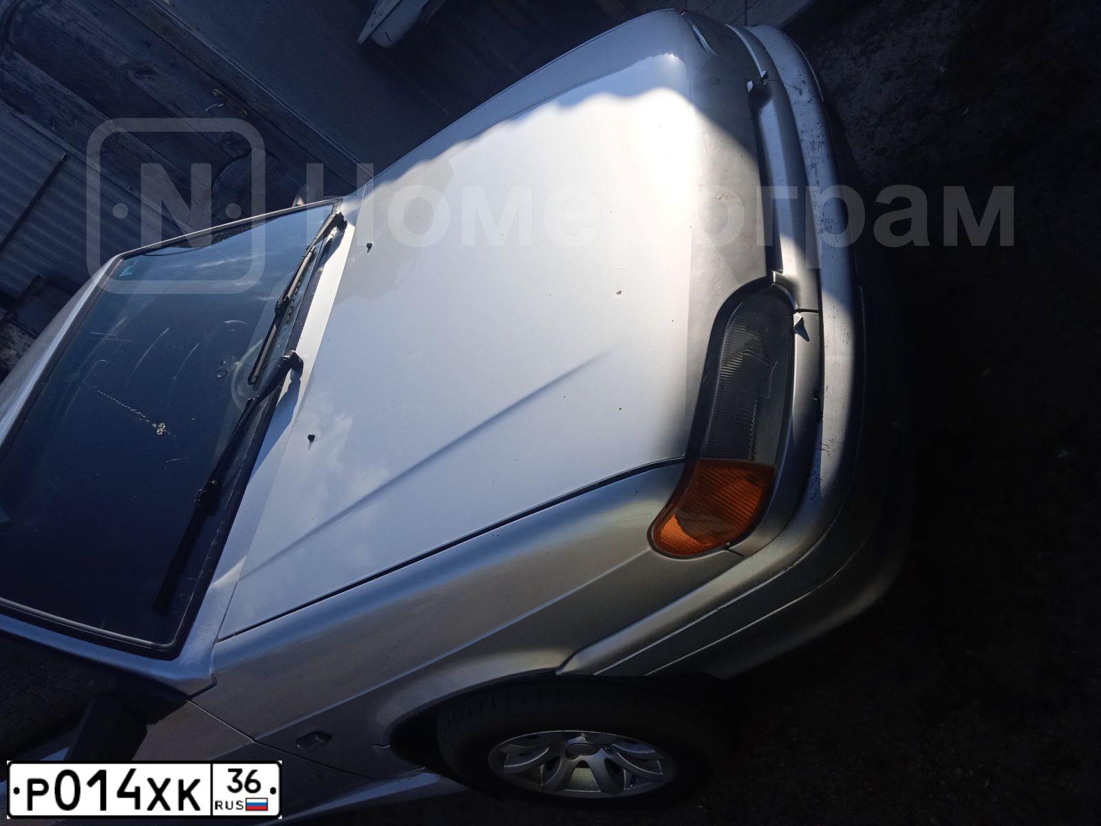 Фото автомобиля VAZ 2114 SAMARA, 2007 — госномер Р014ХК36. Цвет: СВЕТЛО-СЕРЕБРИСТЫЙ МЕТАЛЛИК