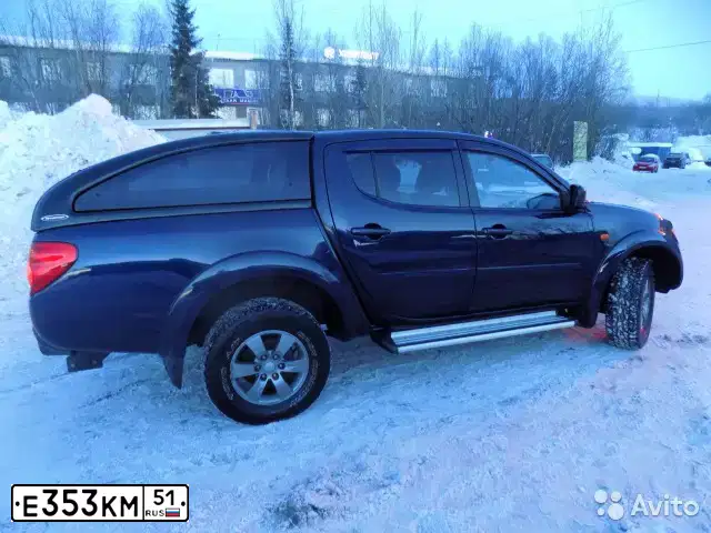 Фото автомобиля KIA SPORTAGE, 2009 — госномер Е353КМ51. Цвет: ЧЕРНЫЙ