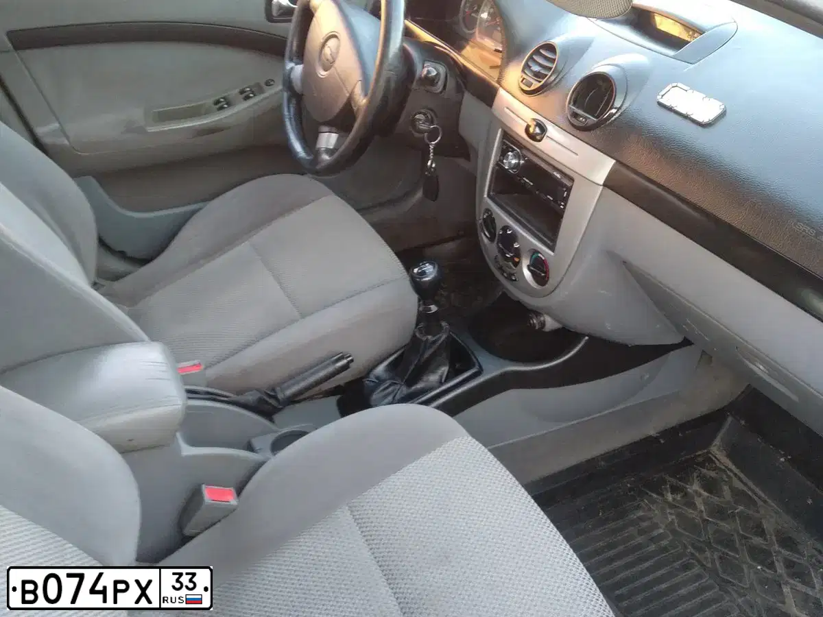 Фото автомобиля CHEVROLET LACETTI, 2008 — госномер В074РХ33. Цвет: ЧЕРНЫЙ