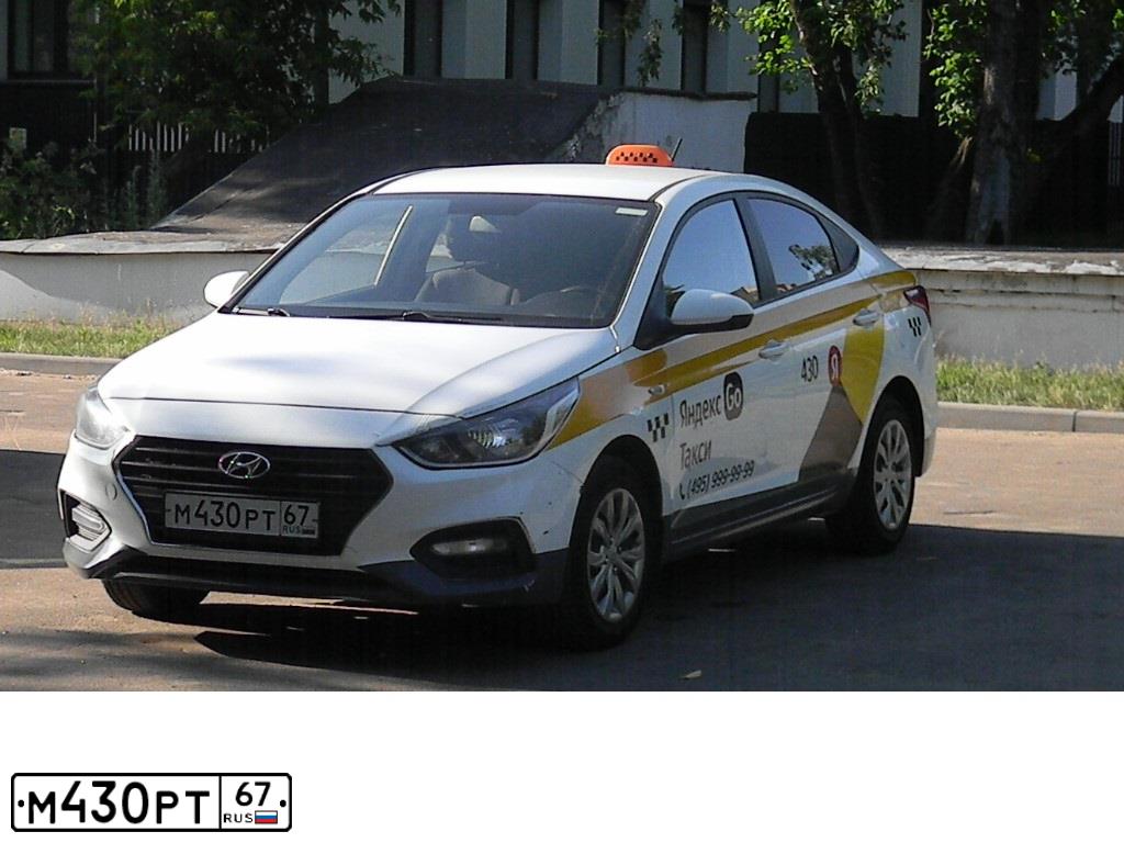 Фото автомобиля HYUNDAI SOLARIS, 2019 — госномер М430РТ67. Цвет: БЕЛЫЙ-ЖЕЛТЫЙ-СЕРЫЙ