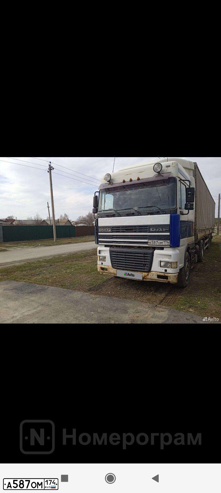 Фото автомобиля DAF XF 95 FT /4X2/, 2002 — госномер А587ОМ174. Цвет: Белый