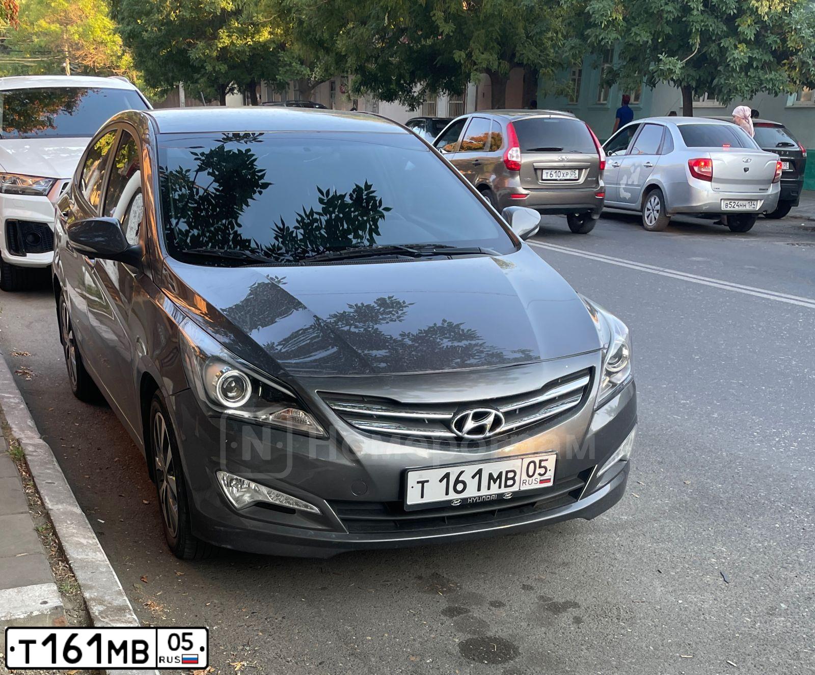 Фото автомобиля HYUNDAI SOLARIS, 2015 — госномер Т161МВ05. Цвет: ТЕМНО СЕРЫЙ