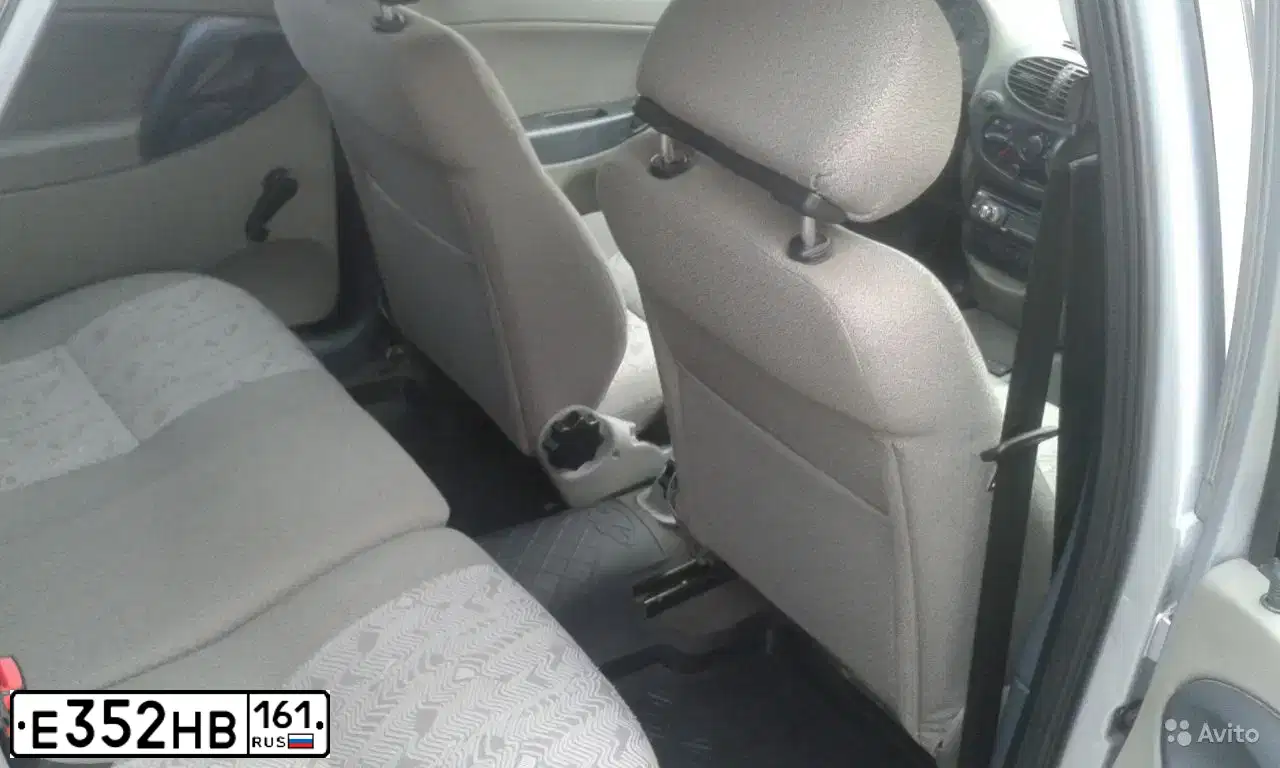 Фото автомобиля LADA 1119 KALINA, 2010 — госномер О009КА761. Цвет: СЕРЕБРИСТЫЙ