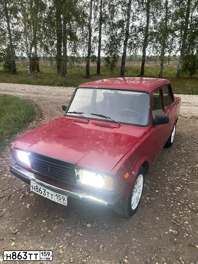 Фото автомобиля LADA 2107 LADA, 2006 — госномер Р323УТ59. Цвет: ВИШНЕВЫЙ