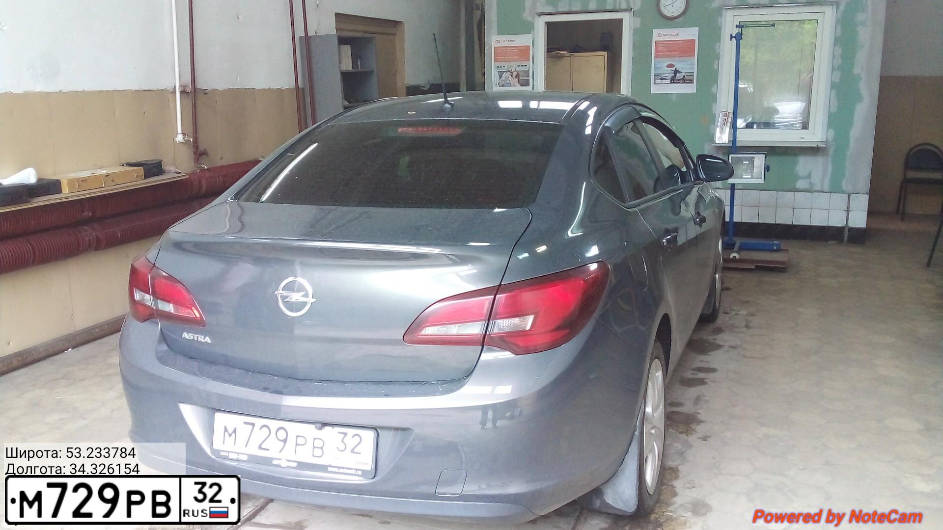 Фото автомобиля OPEL ASTRA, 2013 — госномер М729РВ32. Цвет: СЕРЫЙ МЕТАЛЛИК