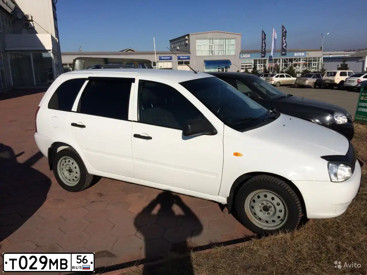 Фото автомобиля LADA 1117 KALINA, 2011 — госномер Т029МВ56. Цвет: Белый