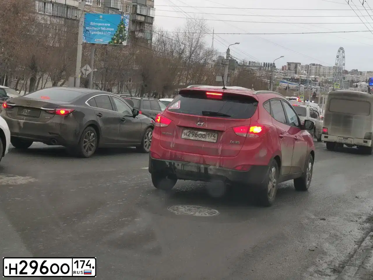 Фото автомобиля HYUNDAI IX35, 2012 — госномер Н296ОО174. Цвет: КРАСНЫЙ