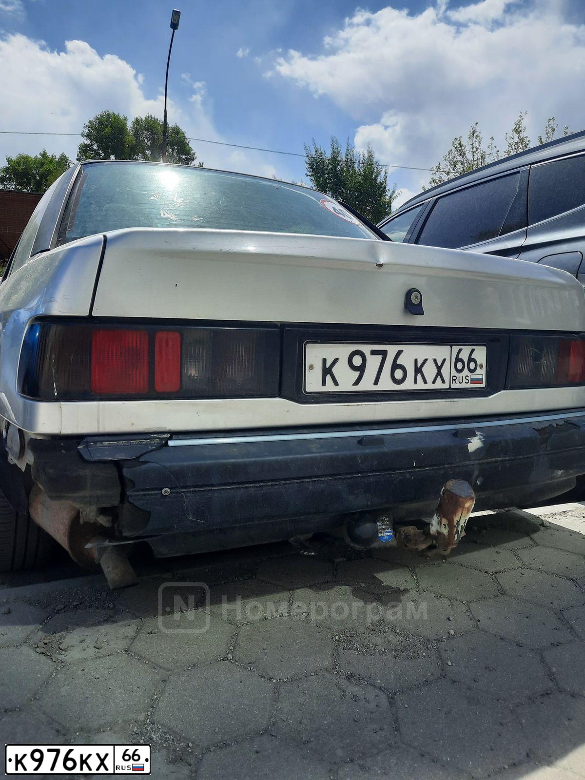 Фото автомобиля FORD SIERRA, 1990 — госномер К976КХ66. Цвет: СЕРЫЙ