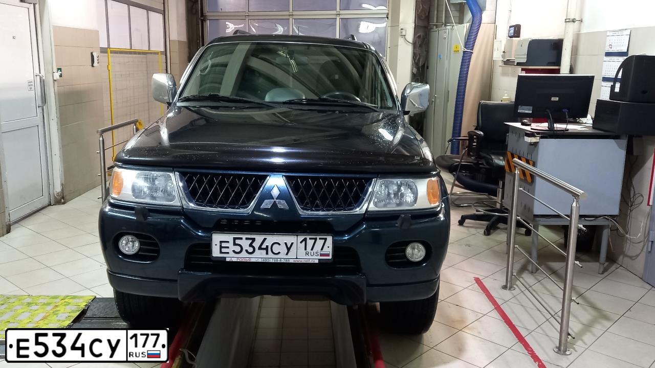 Фото автомобиля MITSUBISHI PAJERO SPORT, 2007 — госномер Е534СУ177. Цвет: ЗЕЛЕНЫЙ