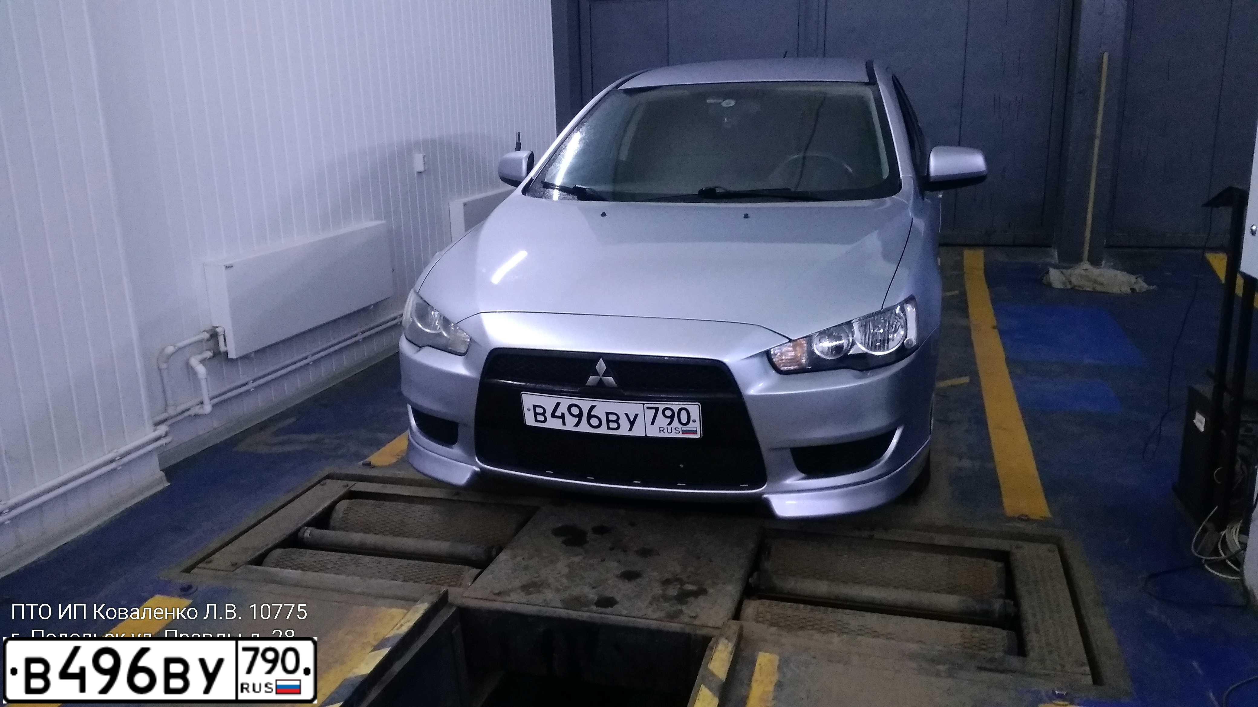 Фото автомобиля MITSUBISHI LANCER, 2008 — госномер В418МН155. Цвет: СЕРЕБРИСТЫЙ
