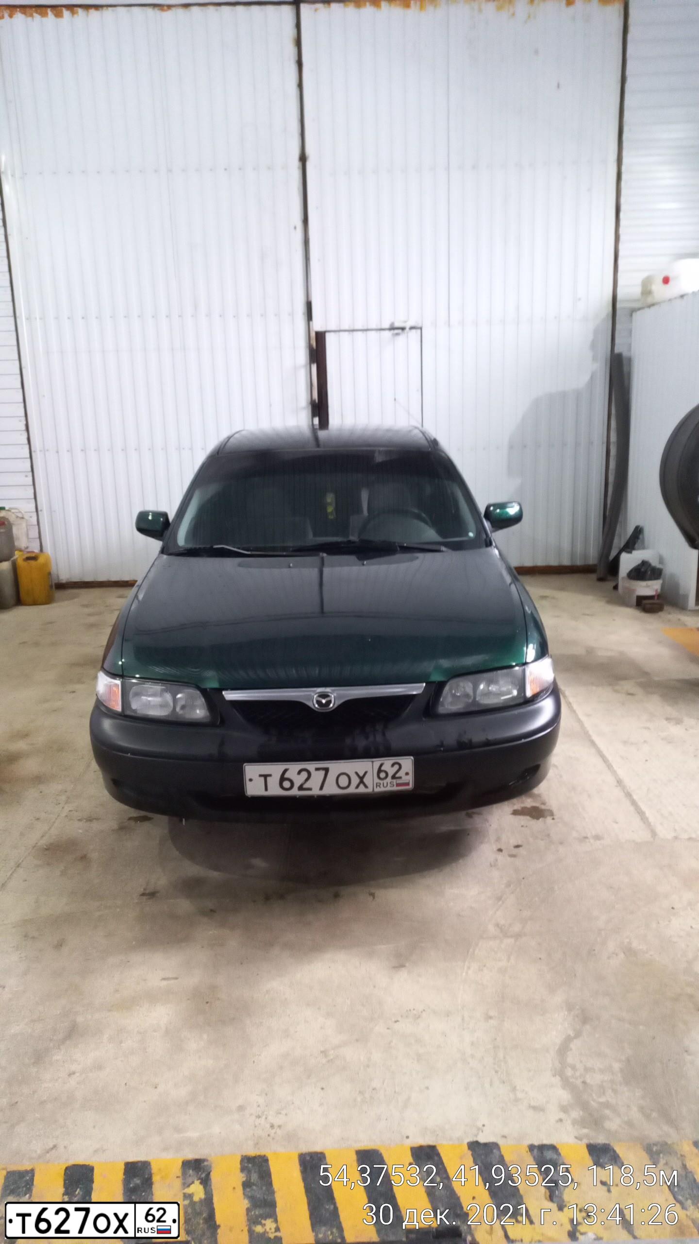 Фото автомобиля MAZDA 626, 1999 — госномер Т627ОХ62. Цвет: ЗЕЛЕНЫЙ