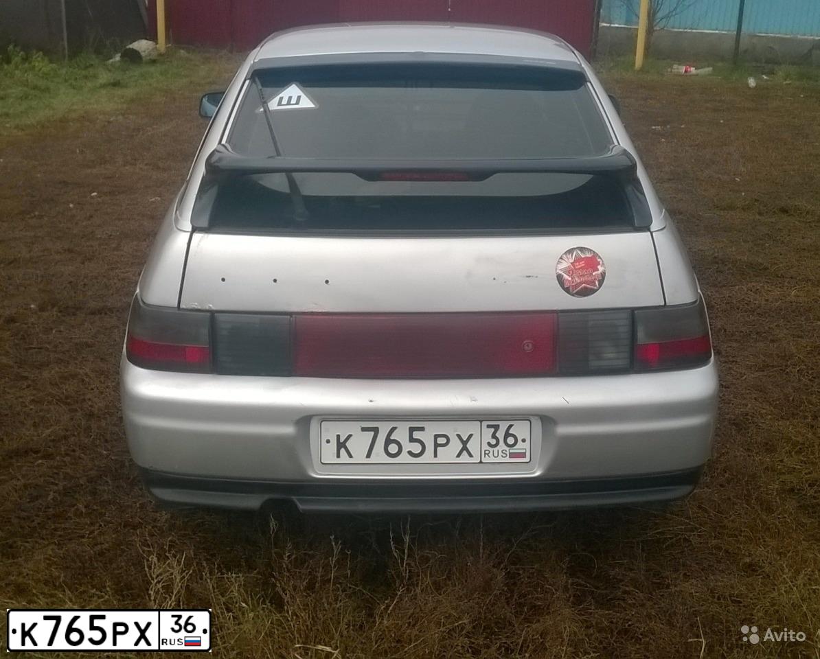 Фото автомобиля LADA 2112, 2003 — госномер К765РХ36. Цвет: Светло-Серебристый металлик