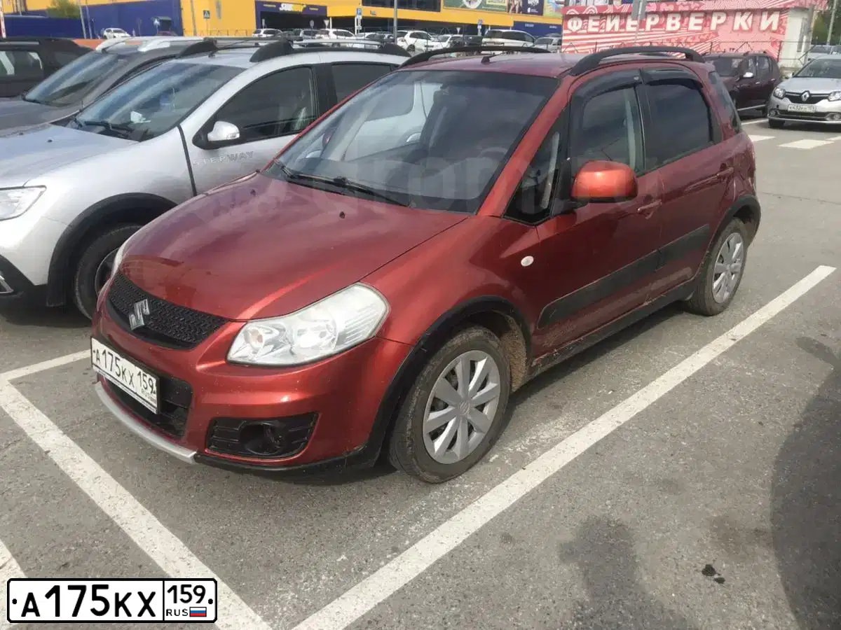 Фото автомобиля SUZUKI SX 4, 2010 — госномер А175КХ159. Цвет: Оранжевый