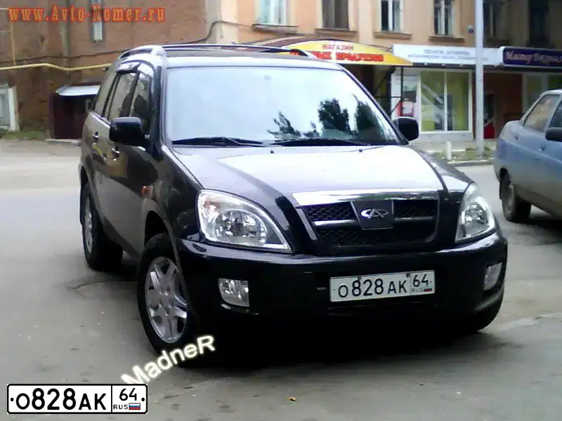 Фото автомобиля CHERY TIGGO, 2006 — госномер О828АК64. Цвет: ЧЕРНЫЙ