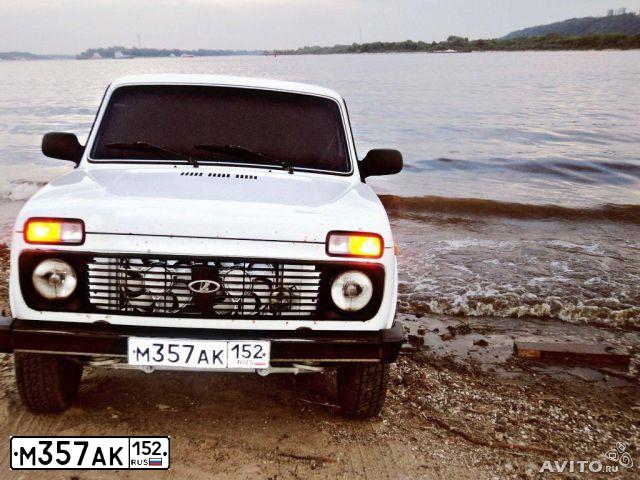 Фото автомобиля LADA 2121 NIVA, 2010 — госномер М357АК152. Цвет: БЕЛЫЙ