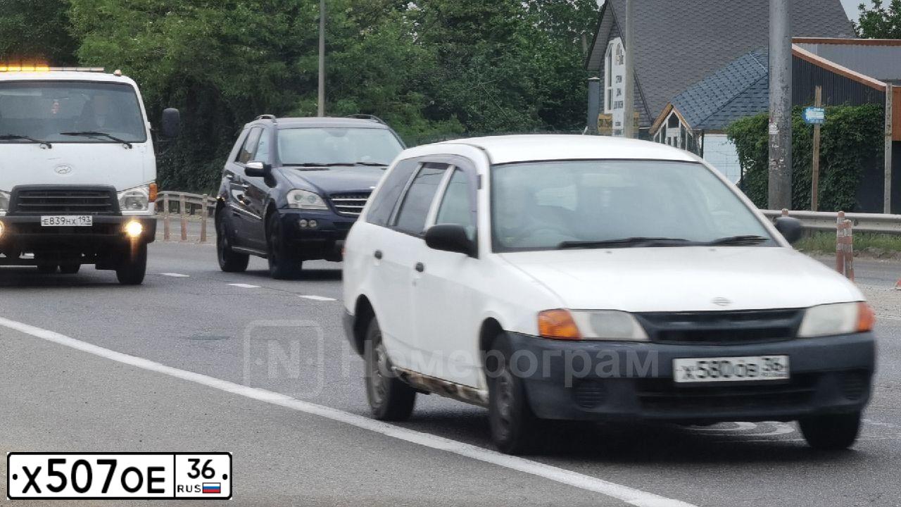 Фото автомобиля KIA SPECTRA, 2008 — госномер Х570ОЕ36. Цвет: ЧЕРНЫЙ