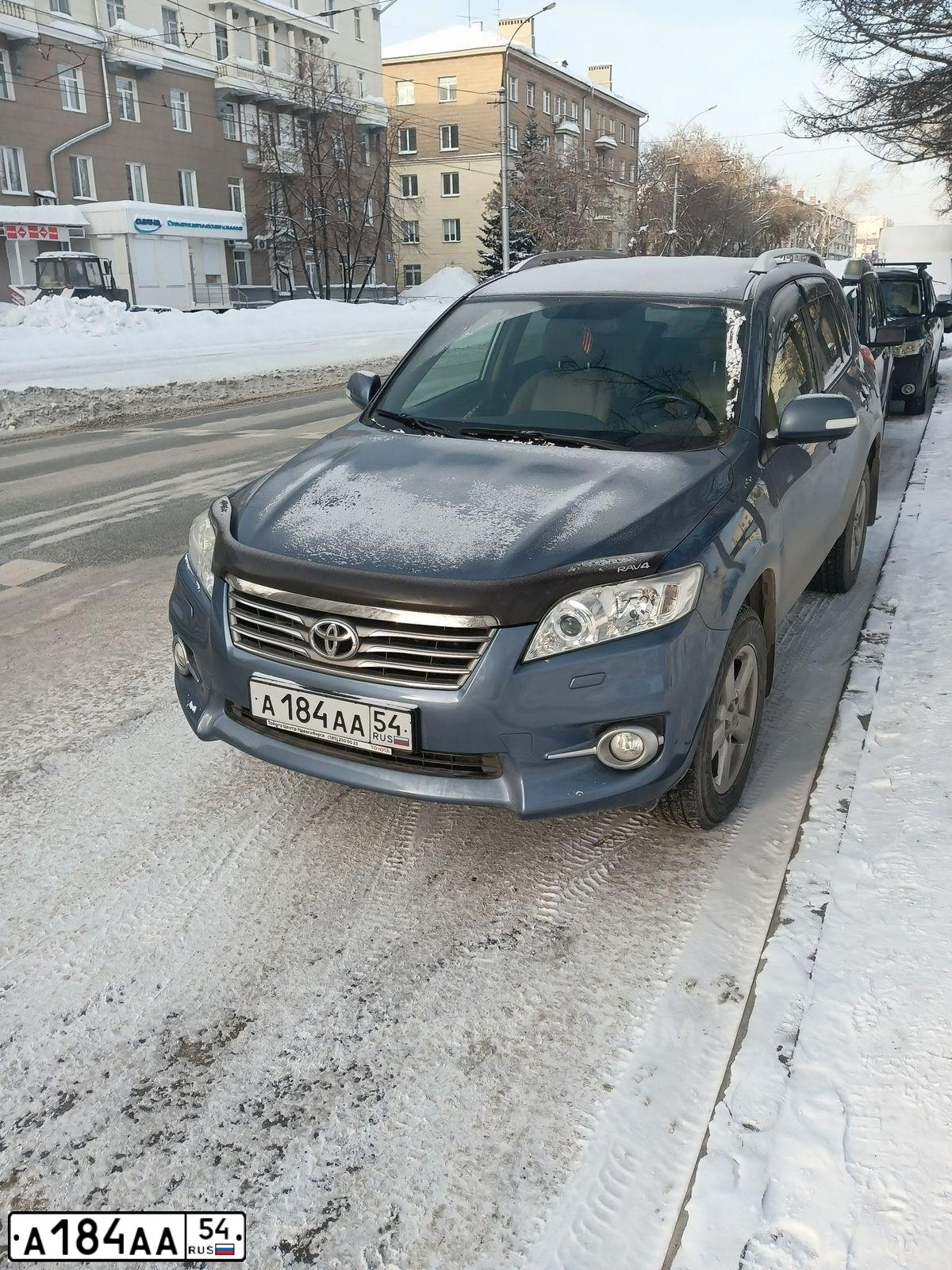 Фото автомобиля TOYOTA RAV4, 2007 — госномер Е780ХК154. Цвет: серебристый