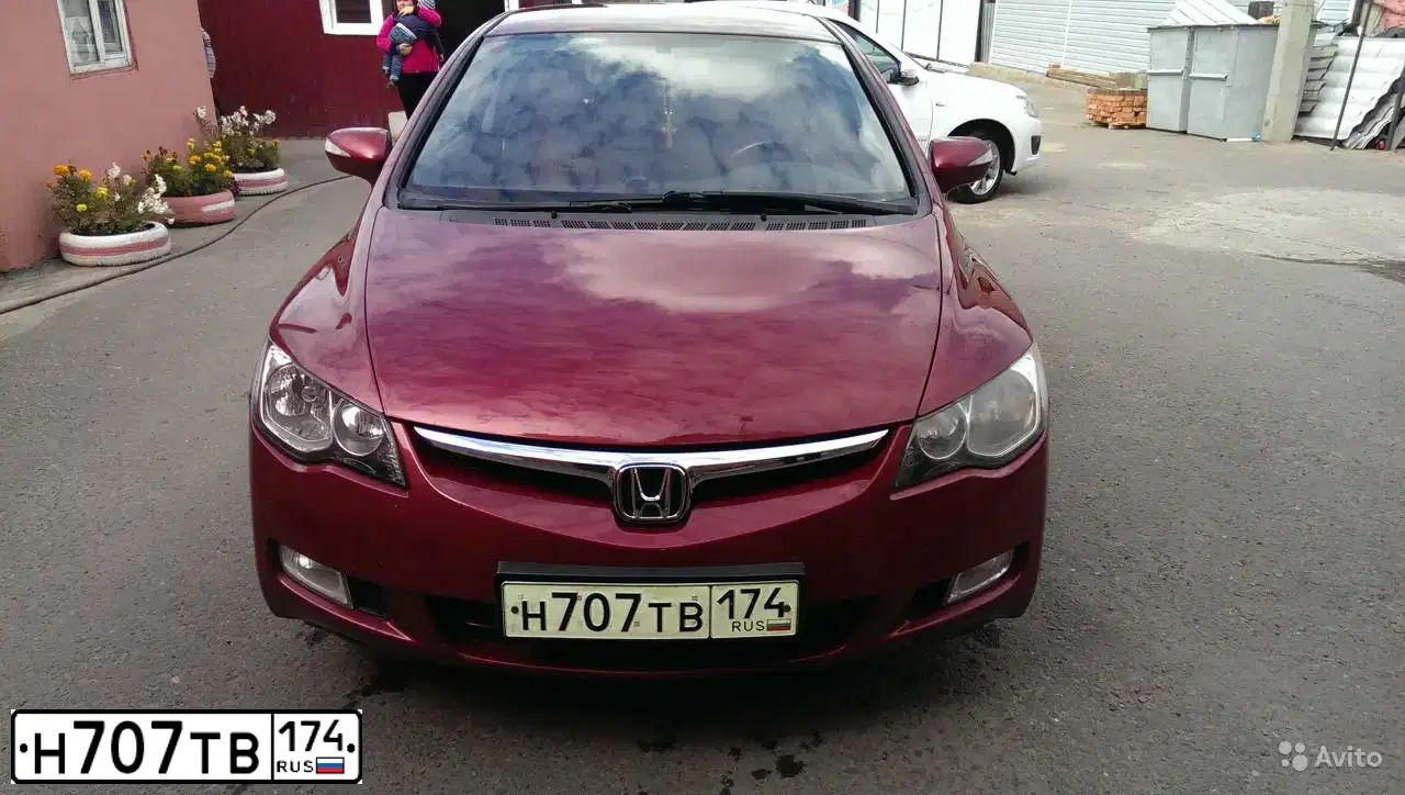 Фото автомобиля HONDA CIVIC, 2007 — госномер Н707ТВ174. Цвет: ТЕМНО-КРАСНЫЙ