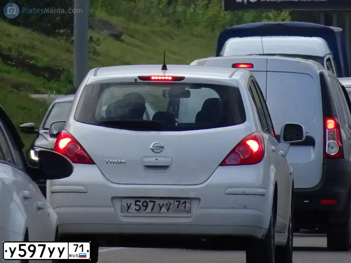 Фото автомобиля NISSAN TIIDA, 2011 — госномер О453АУ193. Цвет: Белый