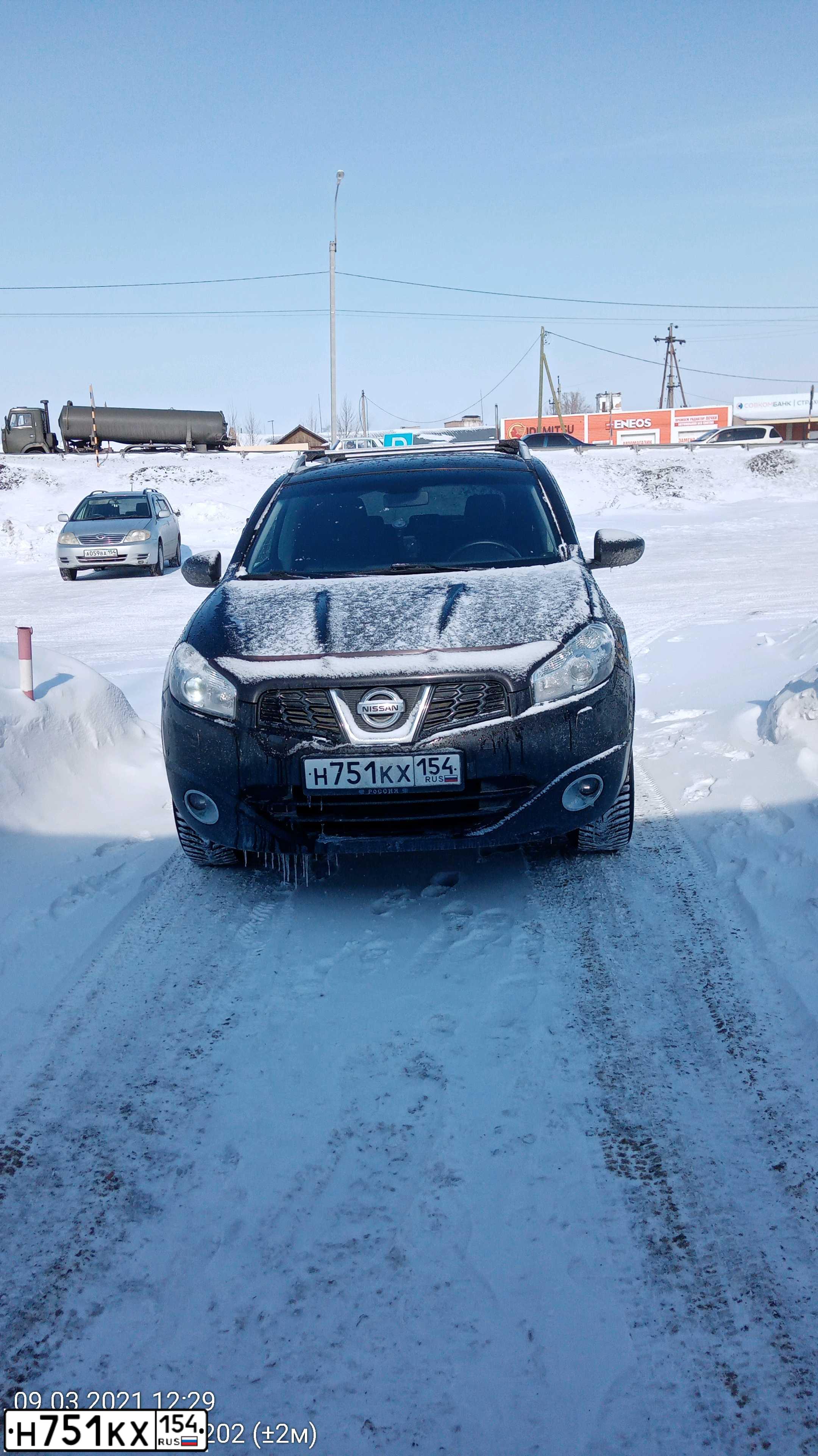 Фото автомобиля NISSAN QASHQAI, 2011 — госномер О211СМ124. Цвет: ЧЕРНЫЙ