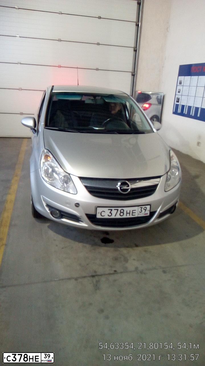 Фото автомобиля OPEL CORSA, 2007 — госномер К153МА199. Цвет: Серебристый