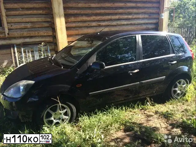 Фото автомобиля FORD FIESTA / ASPIRE, 2008 — госномер Н110КО102. Цвет: ЧЕРНЫЙ