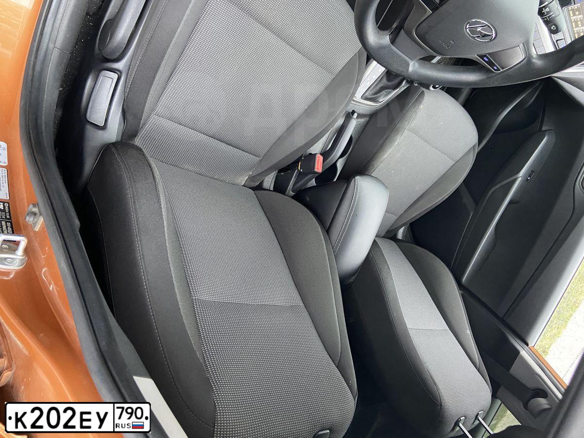 Фото автомобиля HYUNDAI SOLARIS, 2017 — госномер К202ЕУ790. Цвет: Оранжевый