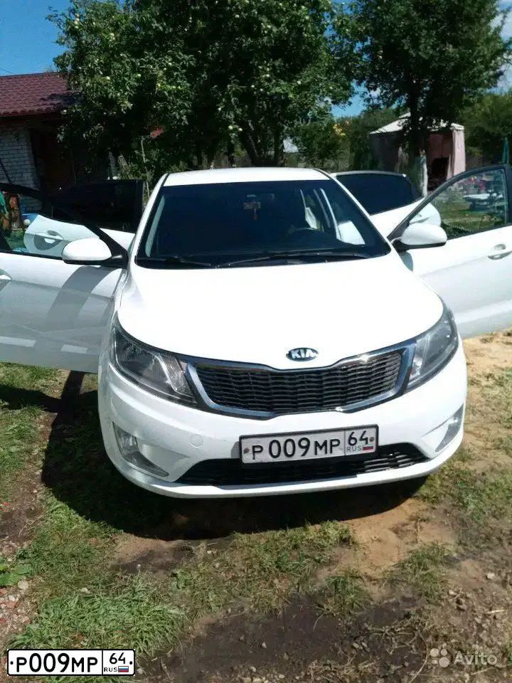 Фото автомобиля KIA RIO, 2013 — госномер К671ЕС134. Цвет: Белый