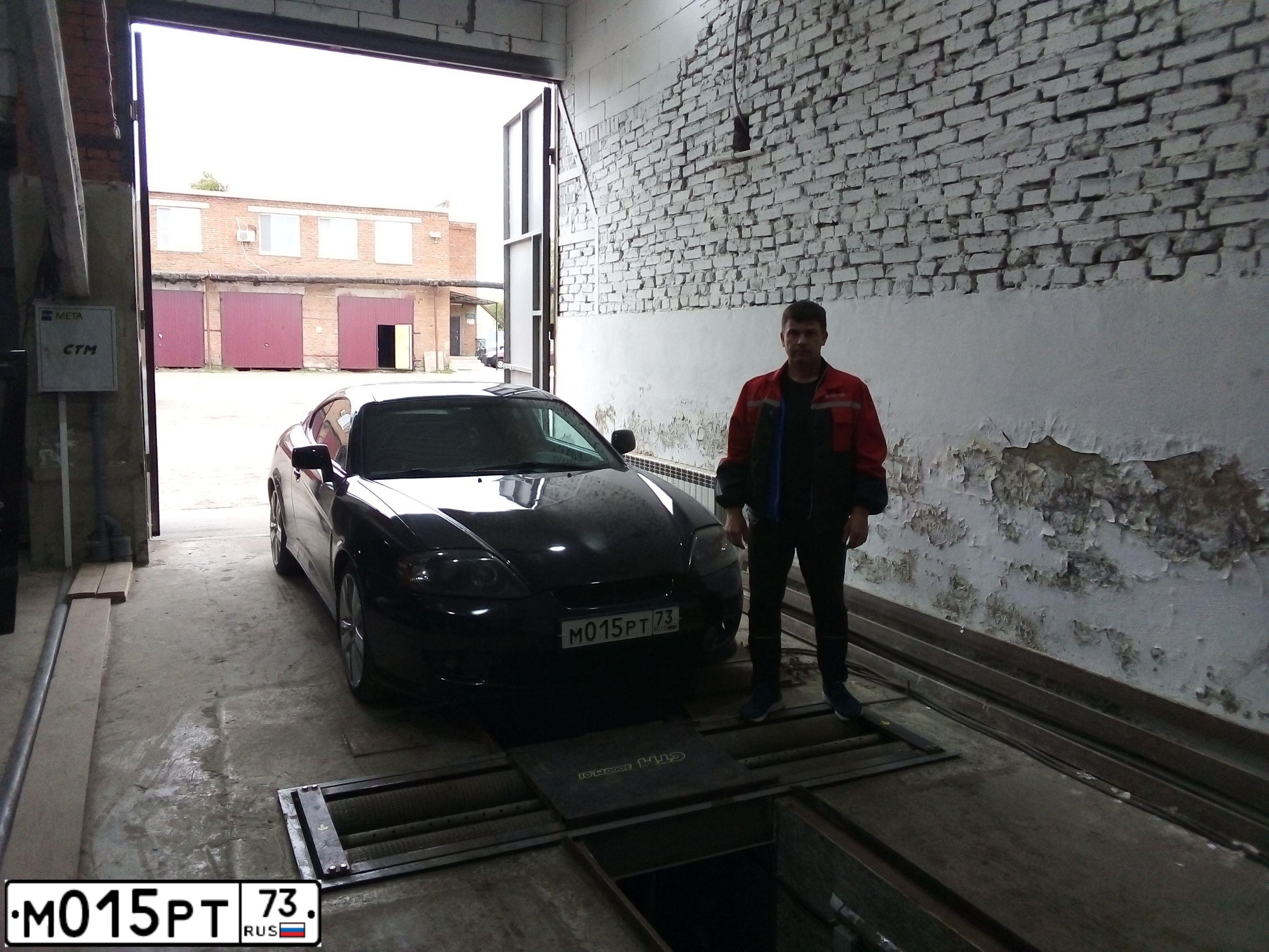 Фото автомобиля ХЕНДЭ ТУСКАНИ, 2004 — госномер М271РР164. Цвет: ЧЕРНЫЙ