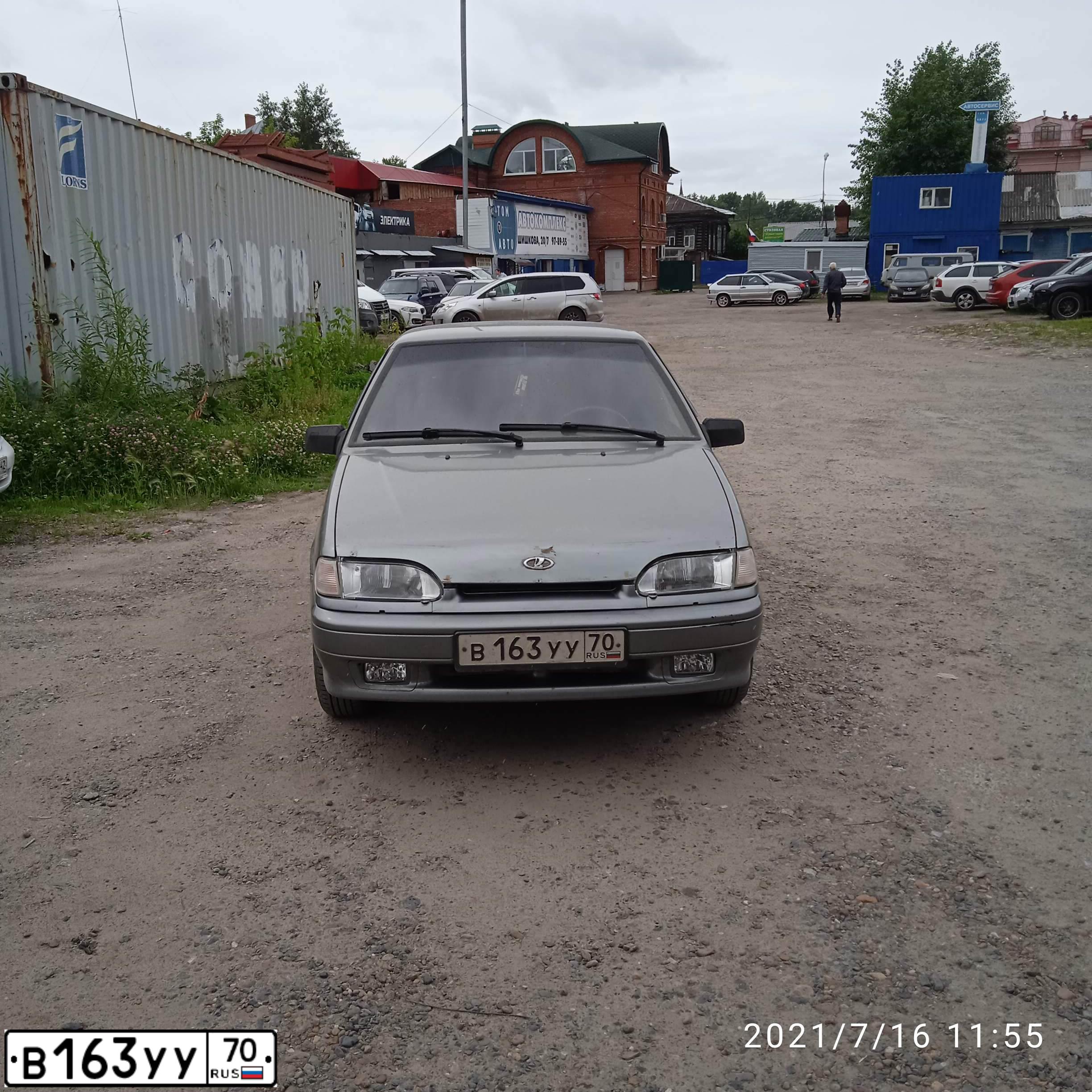 Фото автомобиля LADA 2115 SAMARA, 2007 — госномер В163УУ70. Цвет: СЕРО-ЗЕЛЕНЫЙ