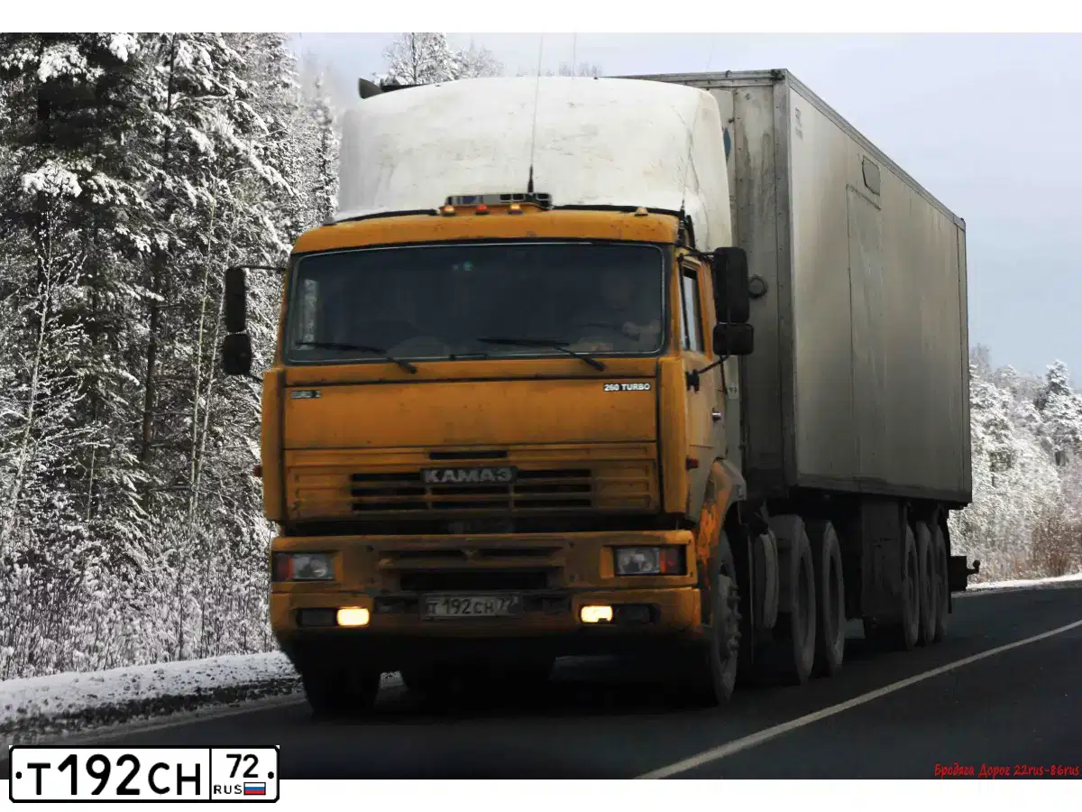 Фото автомобиля KAMAZ 65116 /6X4/, 2004 — госномер Т192СН72. Цвет: ЖЕЛТЫЙ