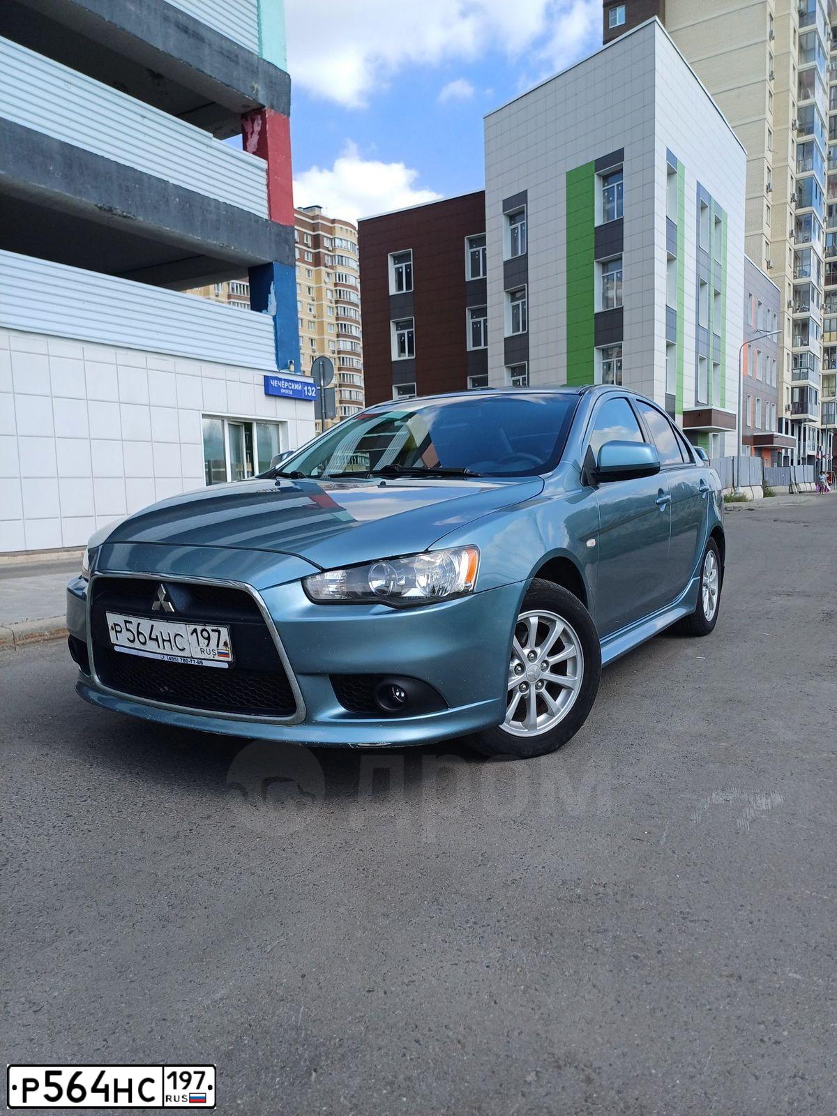 Фото автомобиля MITSUBISHI LANCER, 2011 — госномер Р564НС197. Цвет: СЕРО-ЗЕЛЕНЫЙ