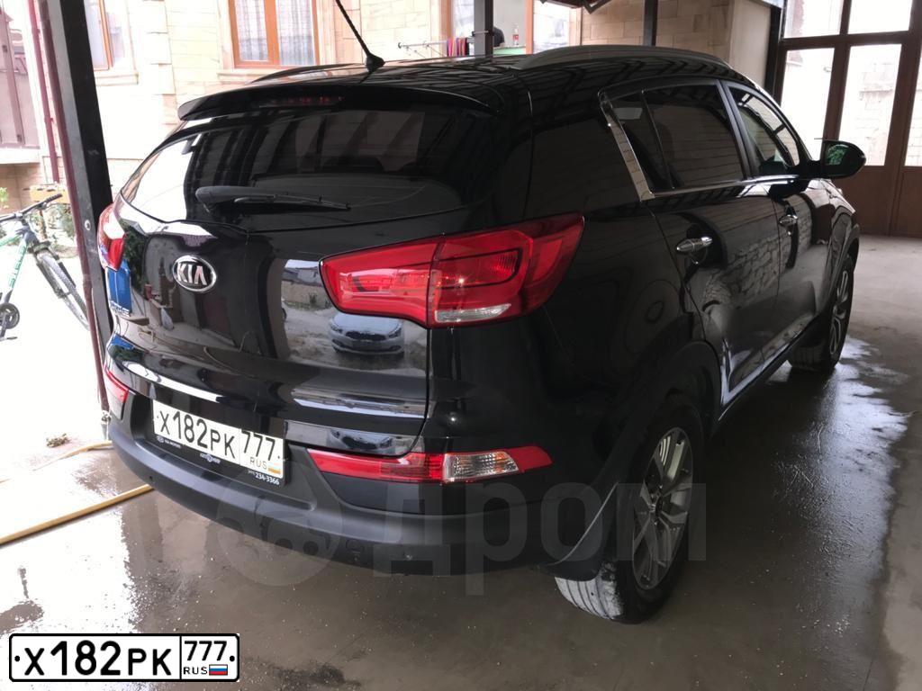 Фото автомобиля КИА, 2015 — госномер Р197ЕЕ05. Цвет: ЧЕРНЫЙ ПЕРЛАМУТ