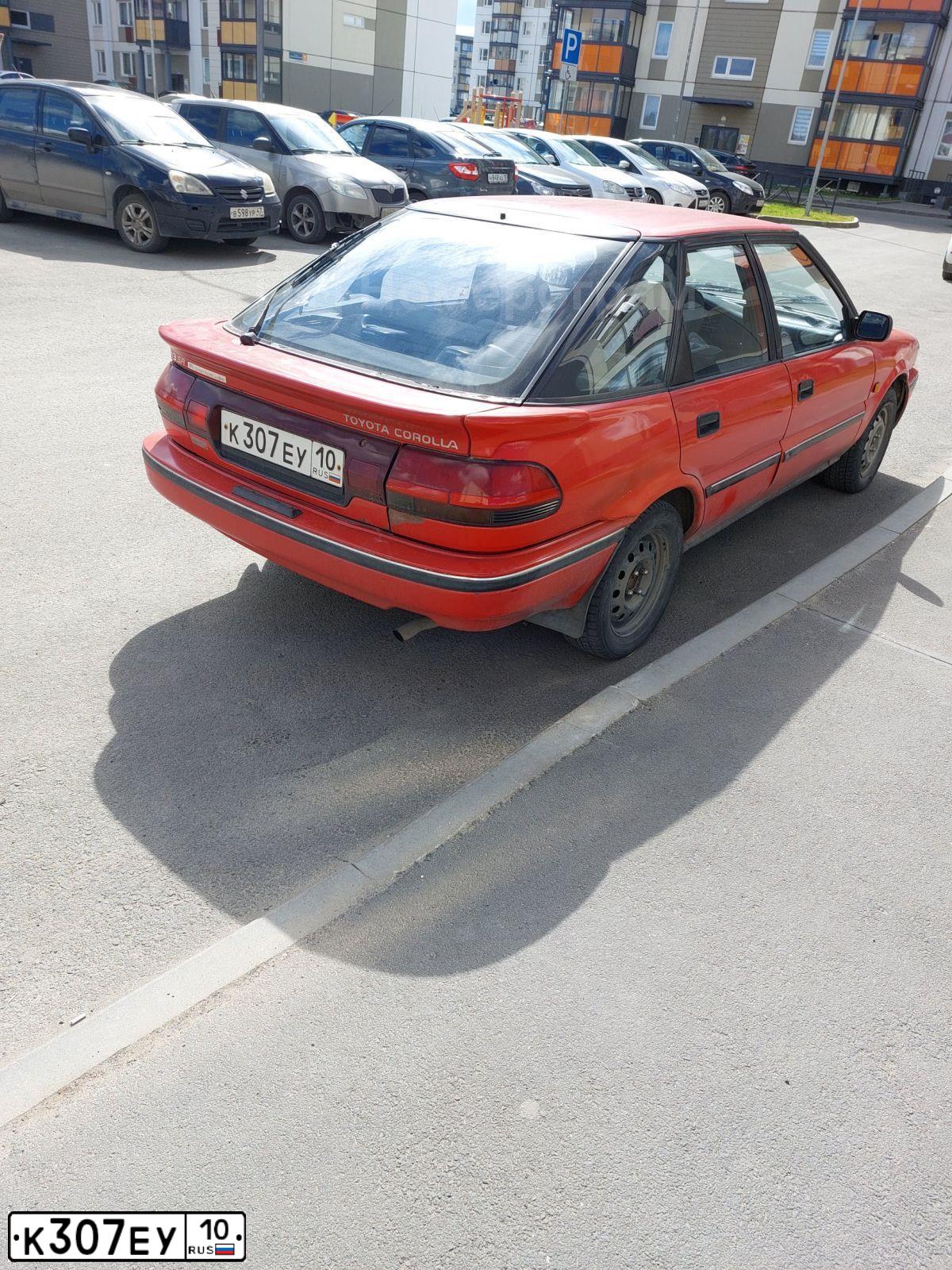 Фото автомобиля TOYOTA COROLLA, 1990 — госномер К307ЕУ10. Цвет: Красный