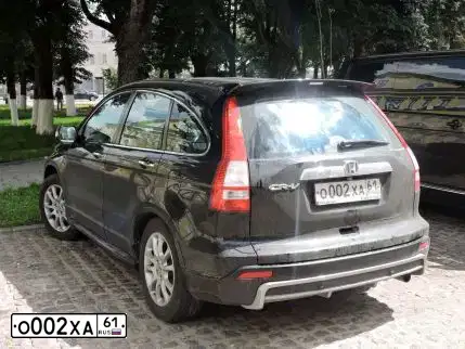 Фото автомобиля HONDA CR-V, 2008 — госномер О002ХА61. Цвет: ЧЕРНЫЙ