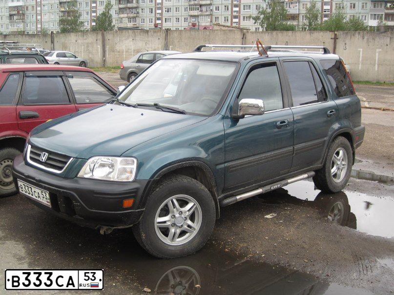 Фото автомобиля CHRYSLER 300C, 2004 — госномер Е216ВЕ147. Цвет: Белый