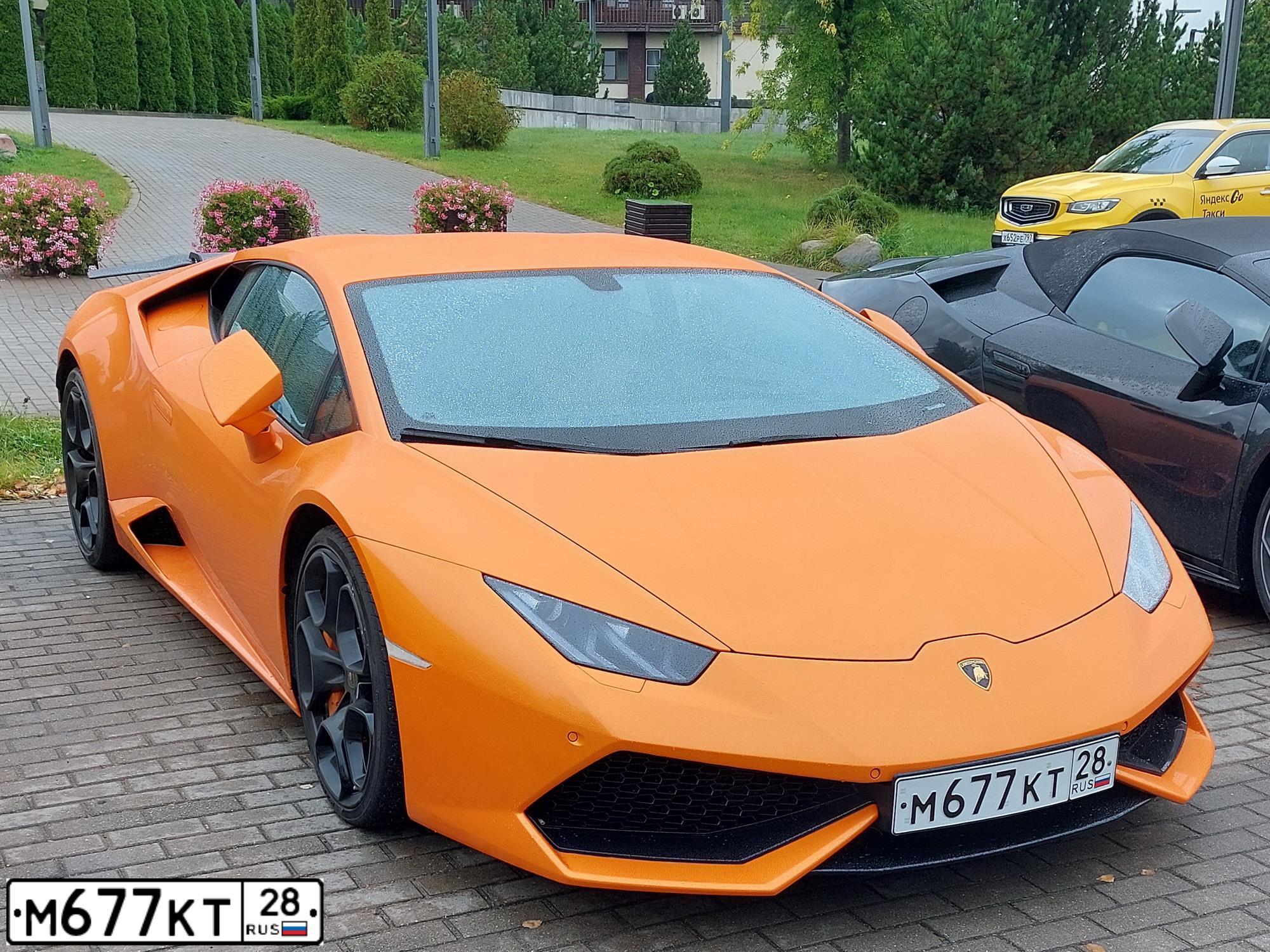 Фото автомобиля LAMBORGHINI HURACAN, 2018 — госномер М159ММ74. Цвет: Оранжевый