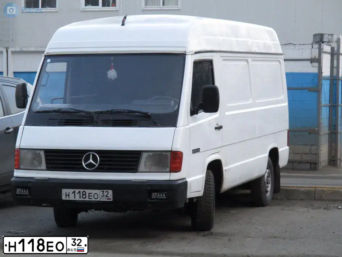 Фото автомобиля MERCEDES MB 100, 1992 — госномер Н118ЕО32. Цвет: Белый