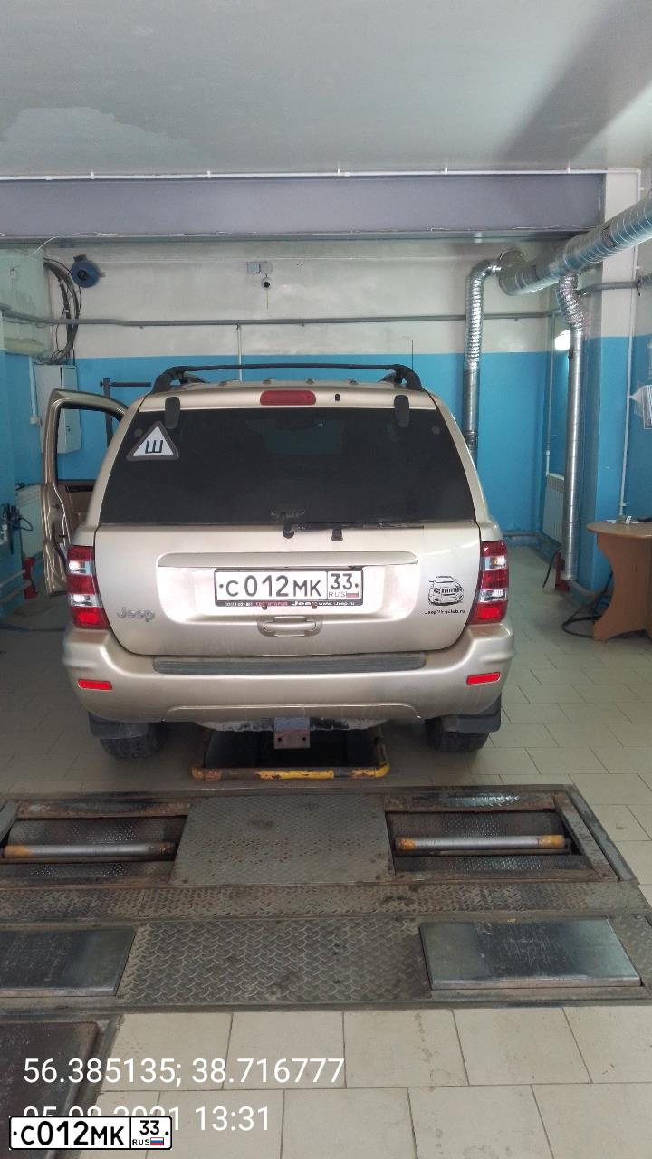 Фото автомобиля JEEP GRAND CHEROKEE, 2000 — госномер Х002КВ197. Цвет: ЖЕЛТЫЙ