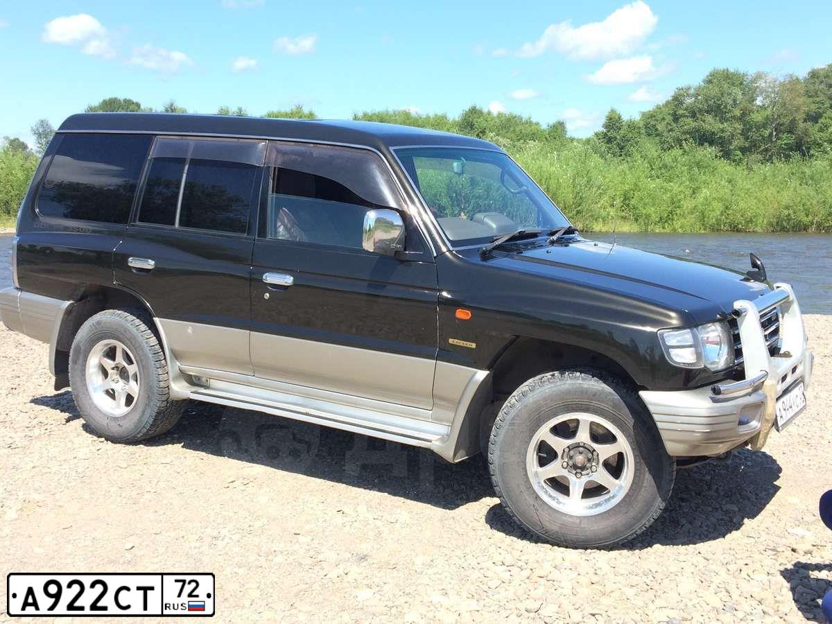 Фото автомобиля LADA 2107, 2004 — госномер Р214ВС186. Цвет: сине-зеленый