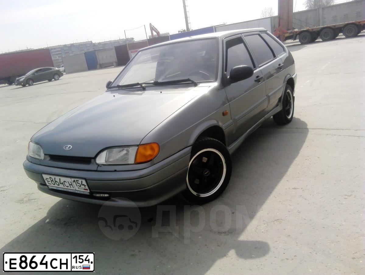 Фото автомобиля HYUNDAI MATRIX, 2009 — госномер Е864СМ154. Цвет: СЕРЫЙ