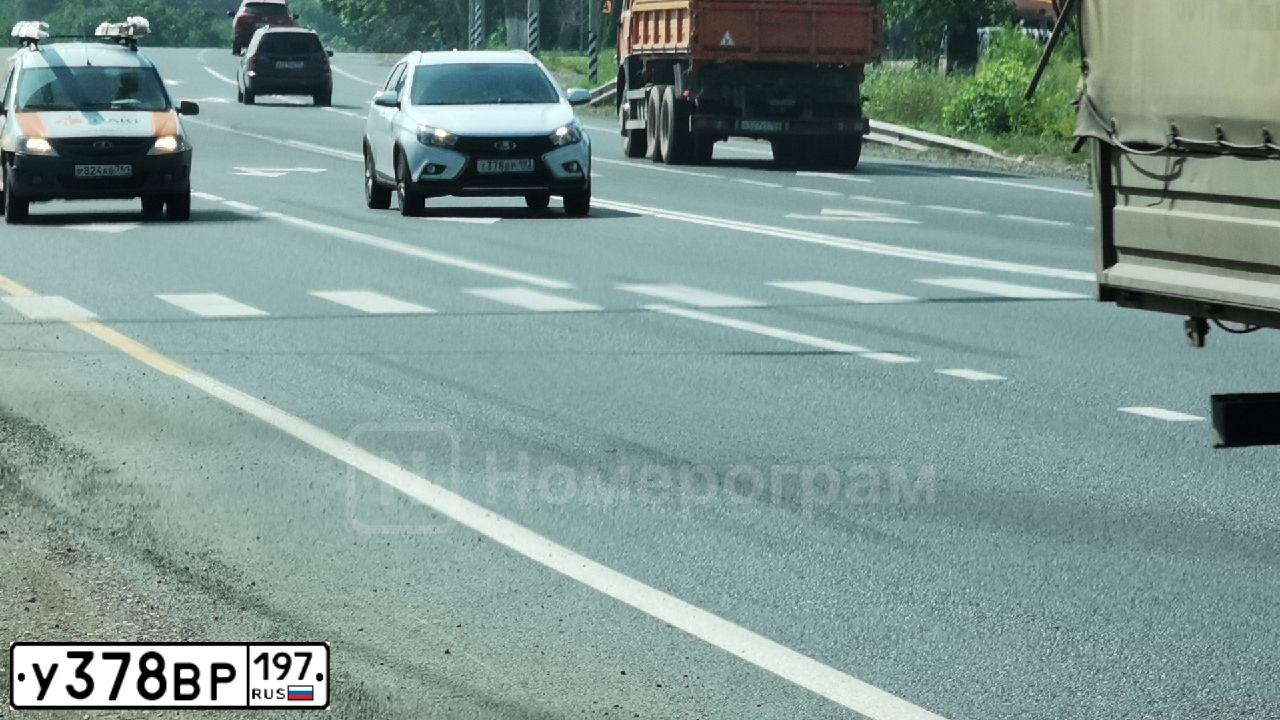 Фото автомобиля LADA 2112, 2002 — госномер У378ВР197. Цвет: КРАСНЫЙ МЕТАЛЛИК