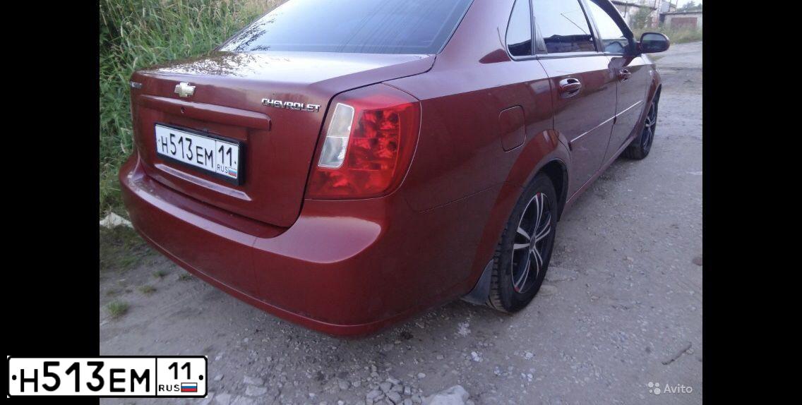 Фото автомобиля CHEVROLET LACETTI, 2006 — госномер О723НН29. Цвет: ТЕМНО-КРАСНЫЙ