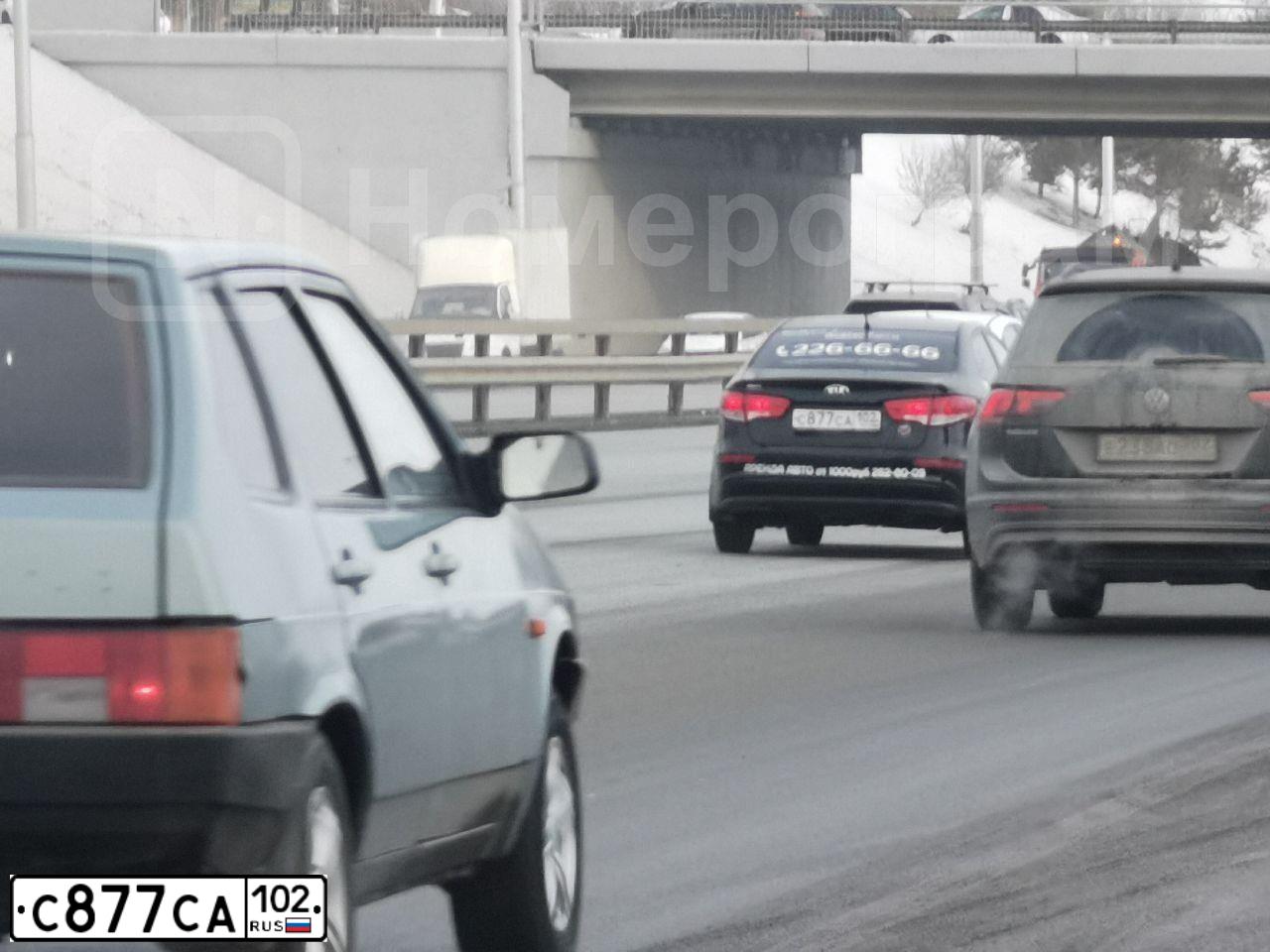 Фото автомобиля KIA RIO, 2015 — госномер В124ТО702. Цвет: ЧЕРНЫЙ