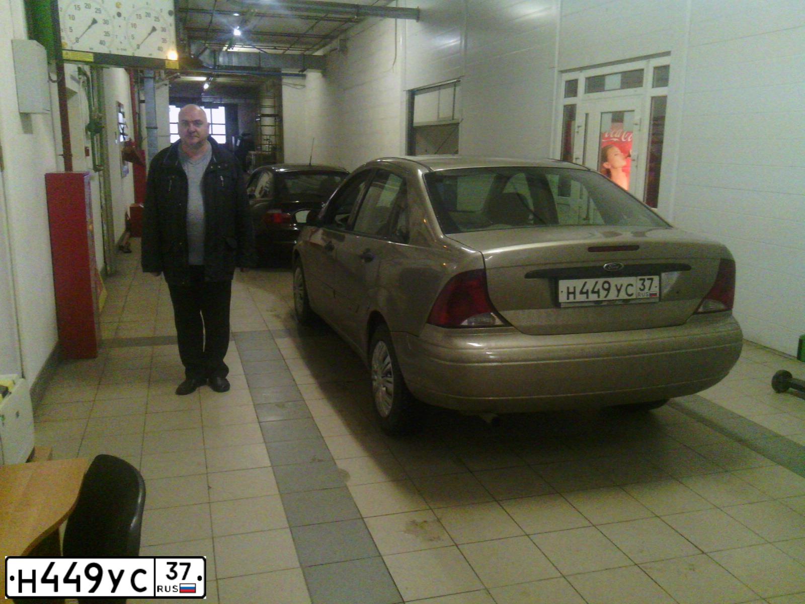 Фото автомобиля FORD FOCUS, 2004 — госномер Н225СВ790. Цвет: ЗОЛОТИСТЫЙ