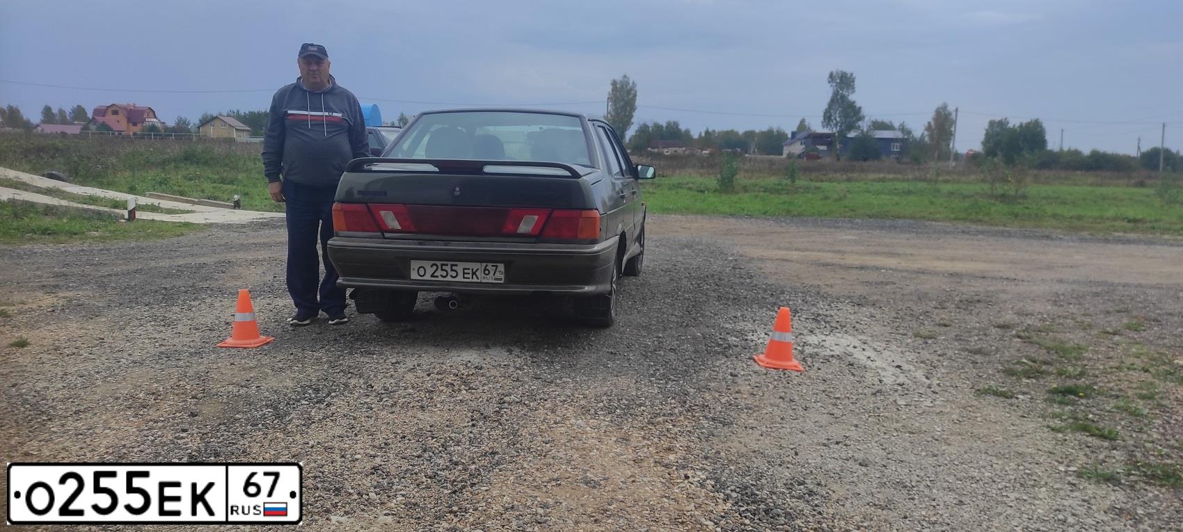 Фото автомобиля LADA 2115 SAMARA, 2006 — госномер О255ЕК67. Цвет: ТЕМНО-ЗЕЛЕНЫЙ
