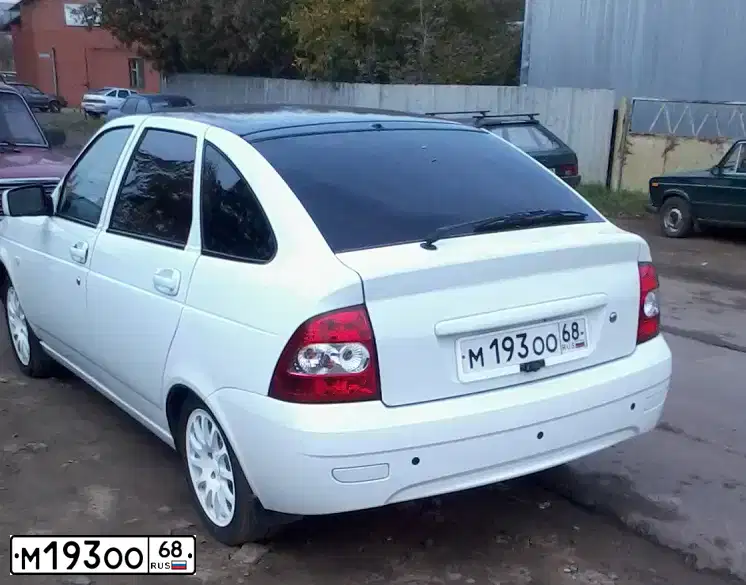 Фото автомобиля LADA 2172 PRIORA, 2010 — госномер Н655ТС68. Цвет: БЕЛЫЙ