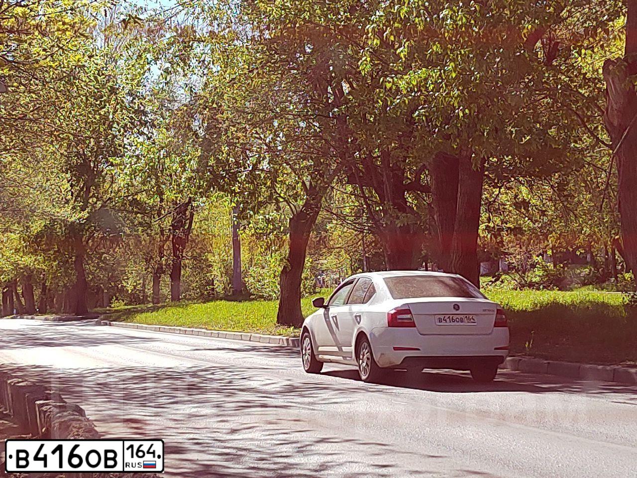 Фото автомобиля SKODA OCTAVIA, 2015 — госномер В416ОВ164. Цвет: Белый