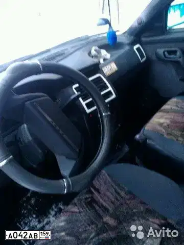 Фото автомобиля LADA 2112, 2005 — госномер Р631СУ18