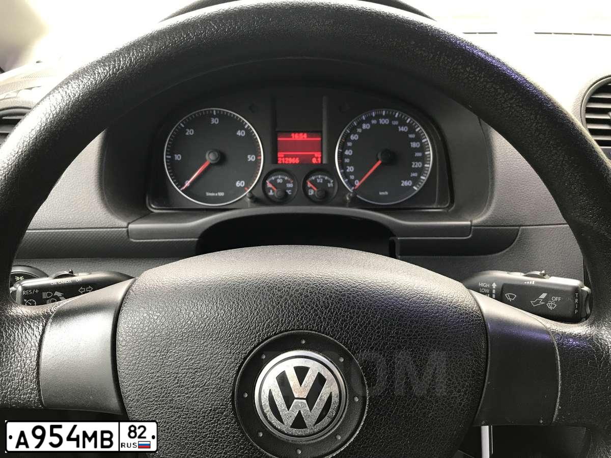 Фото автомобиля VOLKSWAGEN ФОЛЬКСВАГЕН КАДДИ, 2010 — госномер М226УТ82. Цвет: Серый